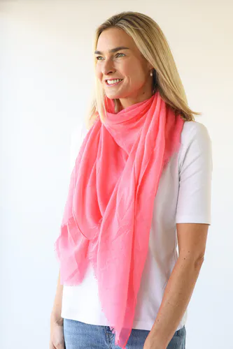 Model wearing Peachy Pink Vibrant Plain Scarf By Archer House Available at Beetees Nelson